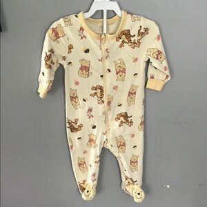 Disney Cream and Yellow Footies One Piece whinnie the Pooh